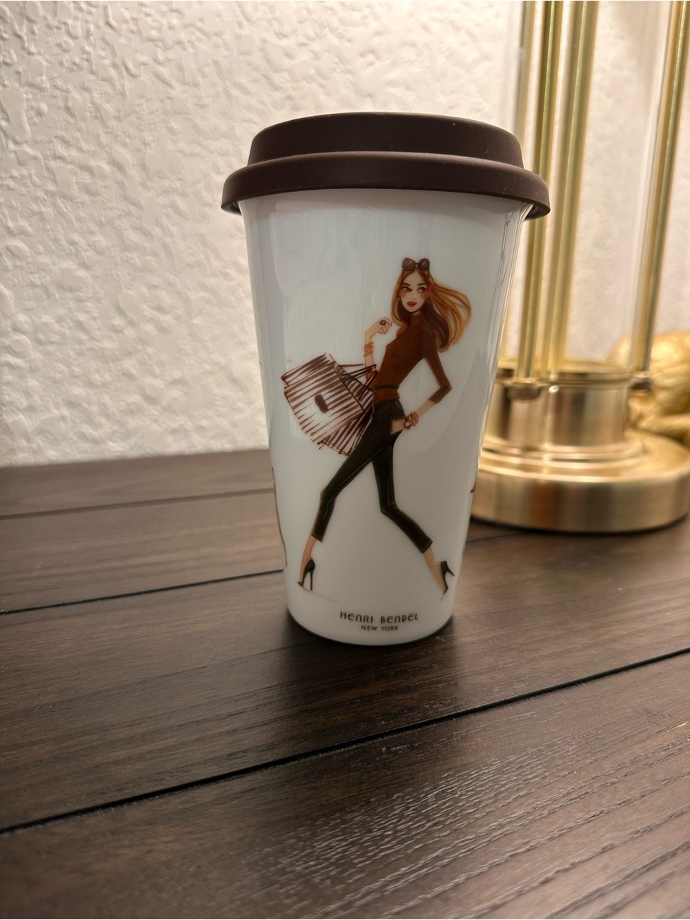Henri Bendel White Travel Mug with Brown lid.